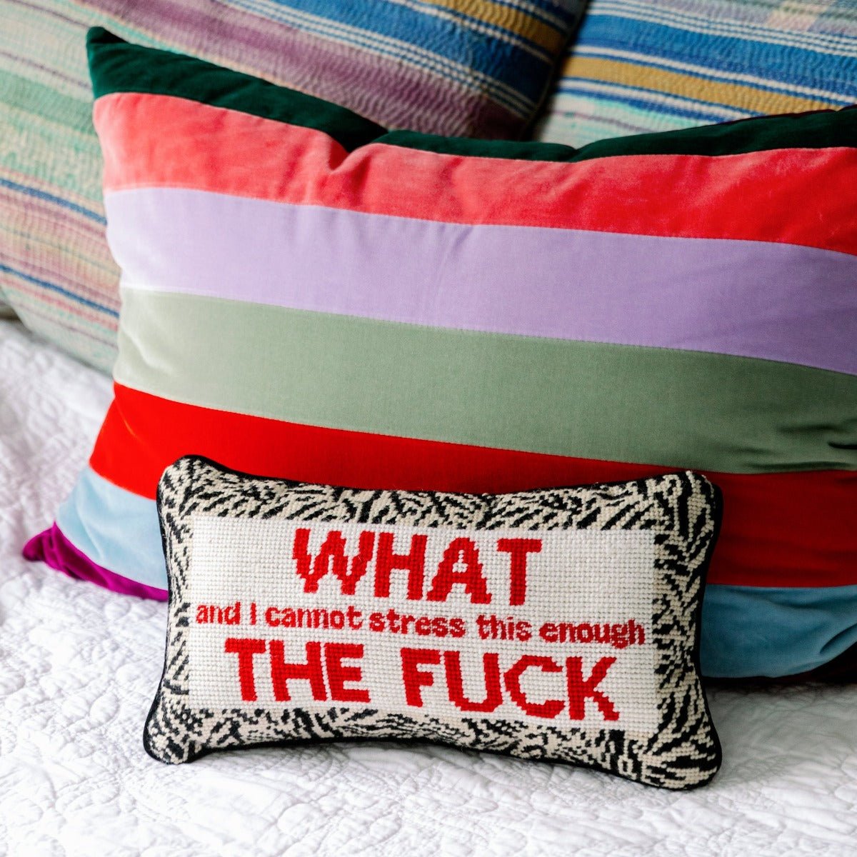 WTF needlepoint pillow with premium 100% wool embroidery and cotton velvet backing, 8x14 inches, for a humorous and stylish home accessory.