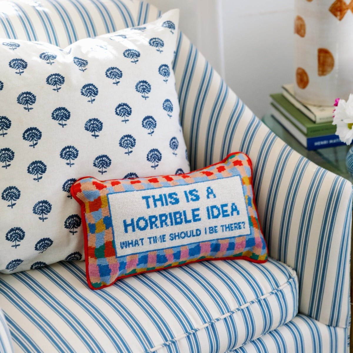 Horrible Idea needlepoint pillow with bold 100% wool embroidery and cotton velvet backing, measuring 9x15 inches, for a playful touch to your decor.
