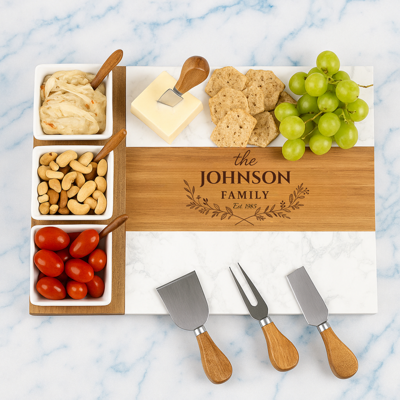 Personalized family charcuterie board with custom engraving on marble and wood