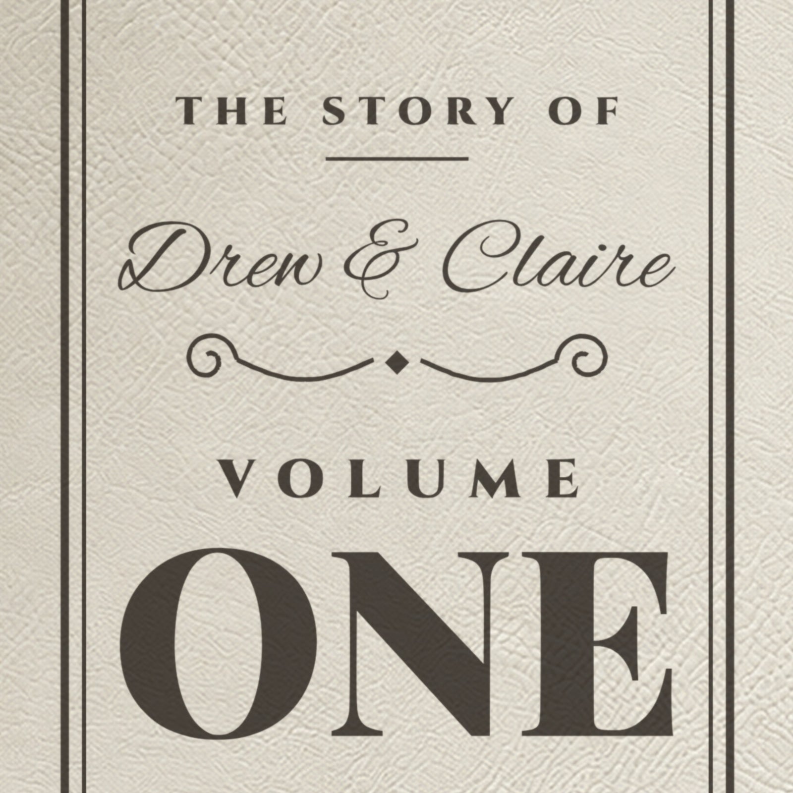 Close-up of the engraving on the first anniversary journal: Drew & Claire in script above a big Volume One and Our First Year of Marriage