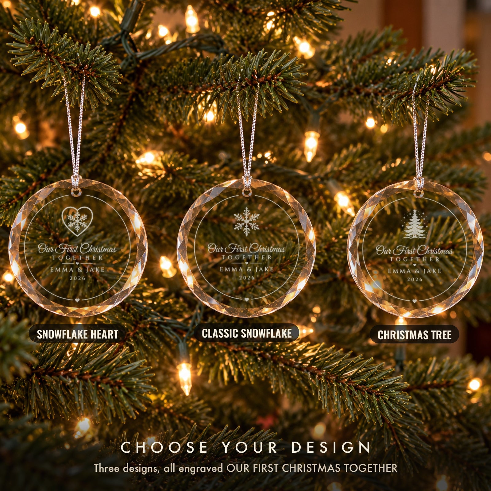 Three Our First Christmas Together ornaments on a tree showing the Snowflake Heart, Classic Snowflake and Christmas Tree designs, each engraved EMMA & JAKE, 2026