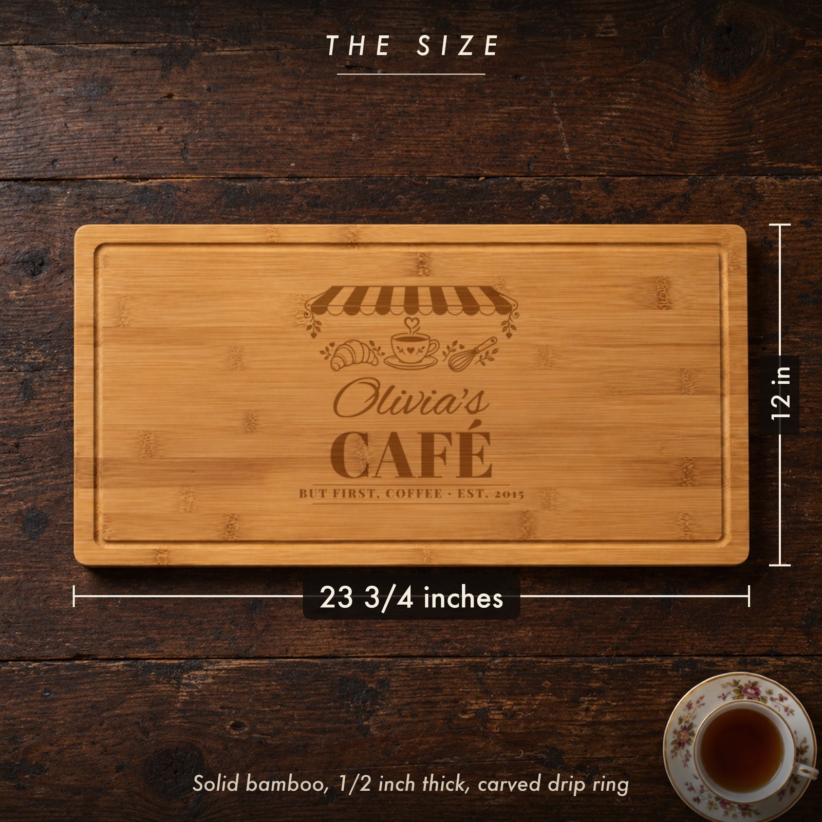 Size of the Her Café cutting board, 23 3/4 inches long by 12 inches wide in half inch solid bamboo, engraved Olivia's CAFÉ BUT FIRST COFFEE