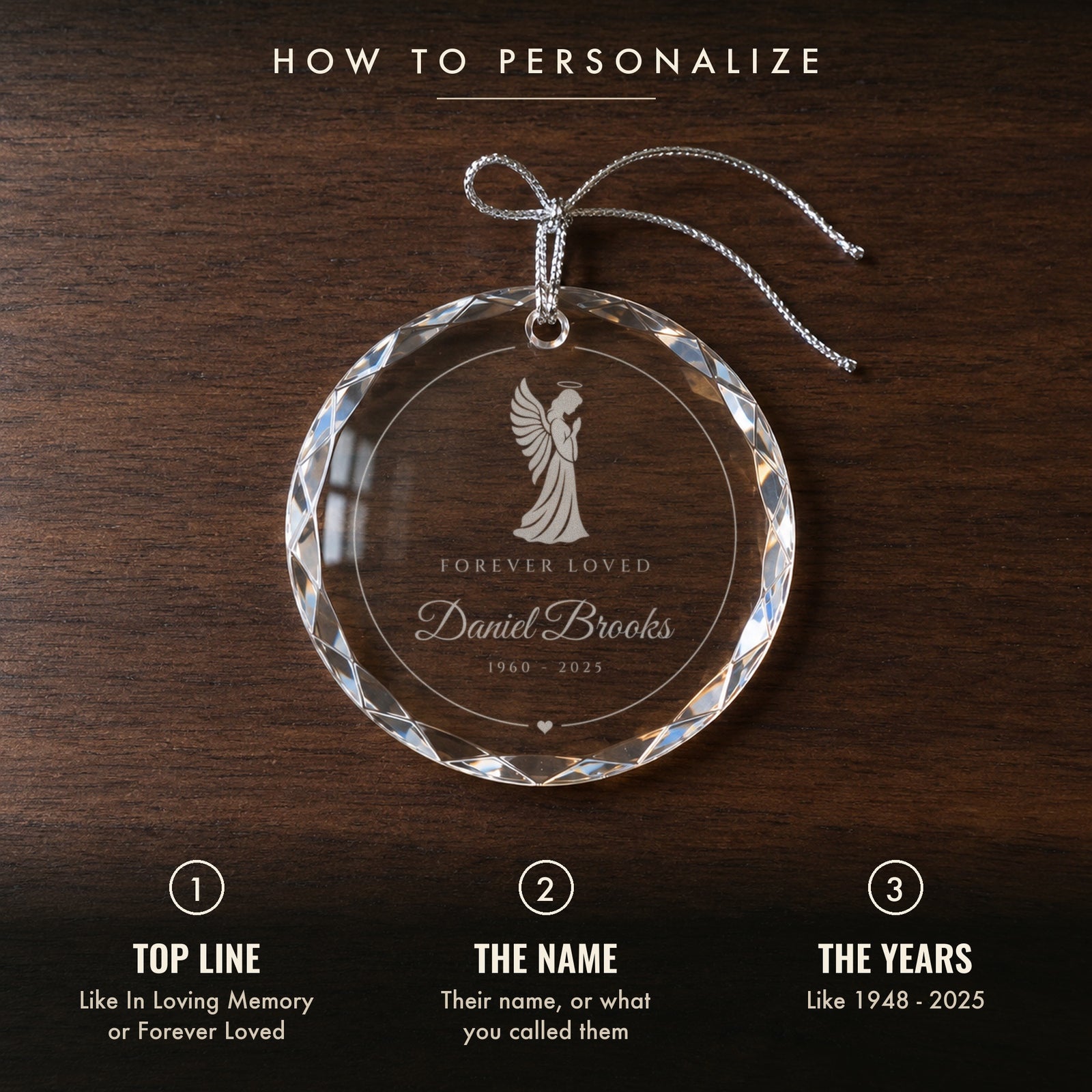 How to personalize the angel memorial ornament: 1 top line, 2 their name, 3 their years, shown on a walnut table with Daniel Brooks engraved