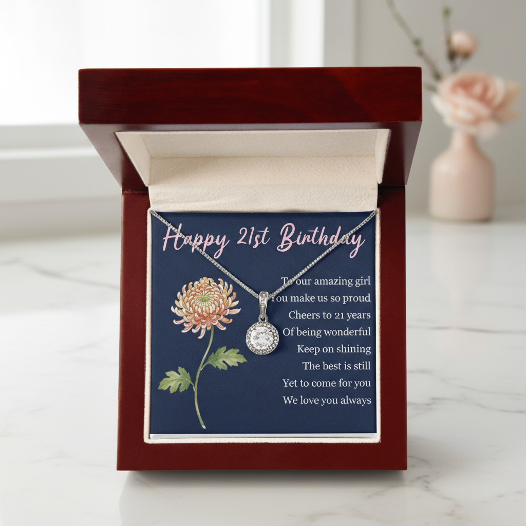 Mahogany gift box opened to reveal personalized navy card with "Happy 21st Birthday" message, birth flower illustration, and silver pendant necklace displayed inside