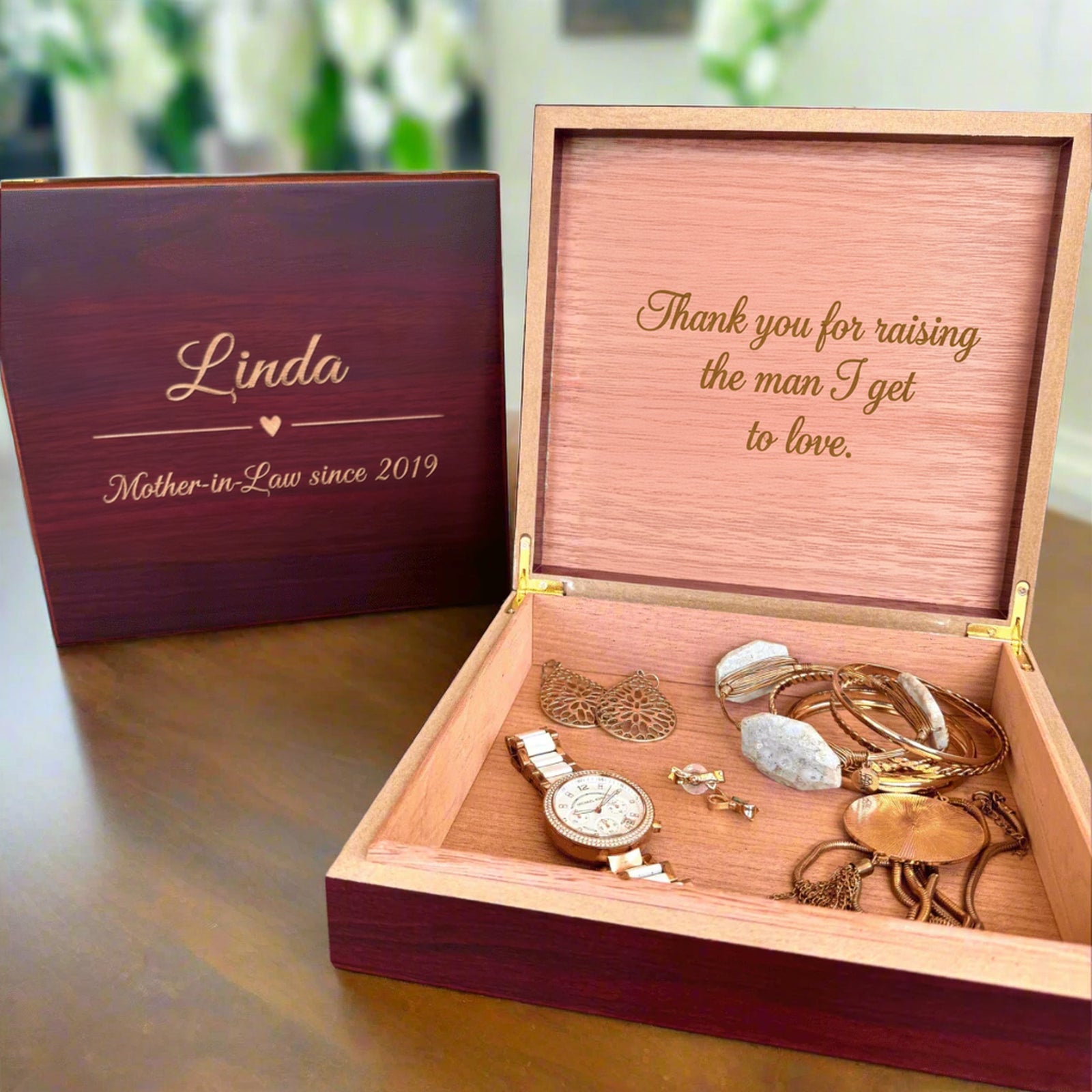 Personalized mother-in-law jewelry box in cherry wood with the sample name Linda engraved on the lid and a thank-you message engraved inside the cedar lining