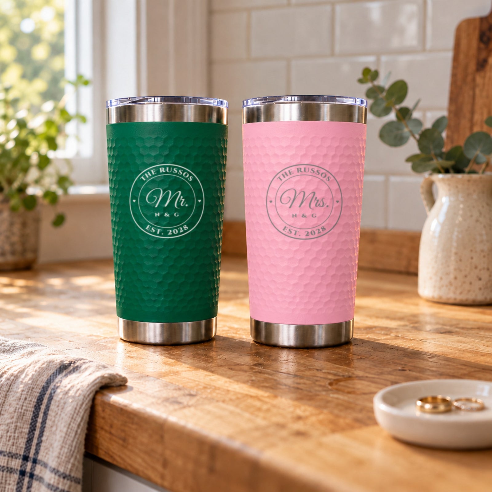 Green Mr. and pink Mrs. engraved tumblers for The Russos, Est. 2028, the green and pink color choice of the Mr. and Mrs. tumbler set