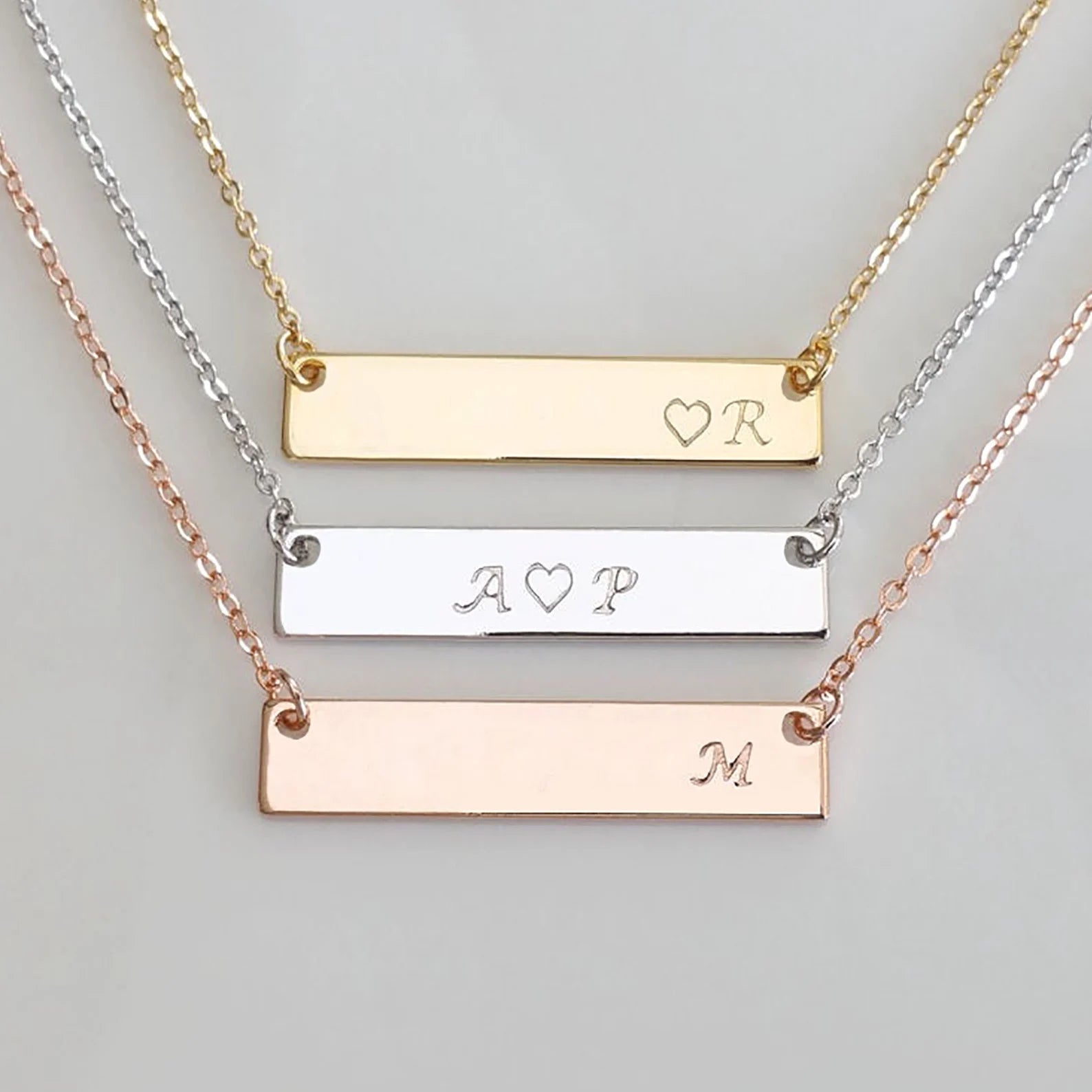 Love-ly Personalized Bar Necklace in gold, silver, and rose gold with custom engraved initials