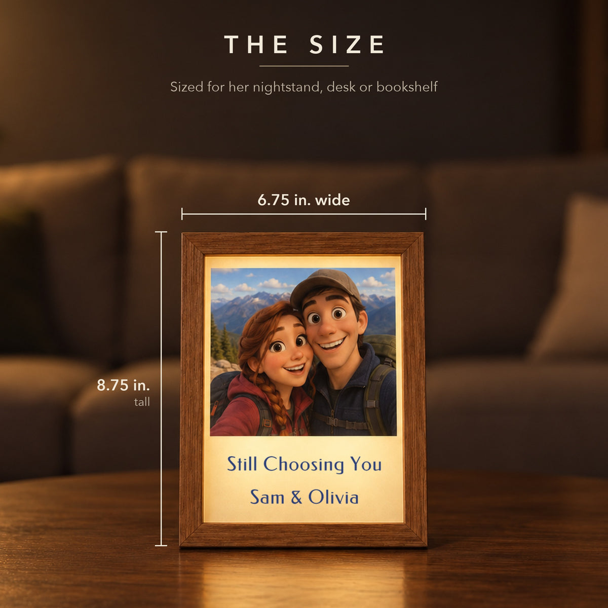 Size of the animated picture frame, 6.75 inches wide by 8.75 inches tall, a hiking couple drawn as a cartoon with Still Choosing You, Sam &amp; Olivia