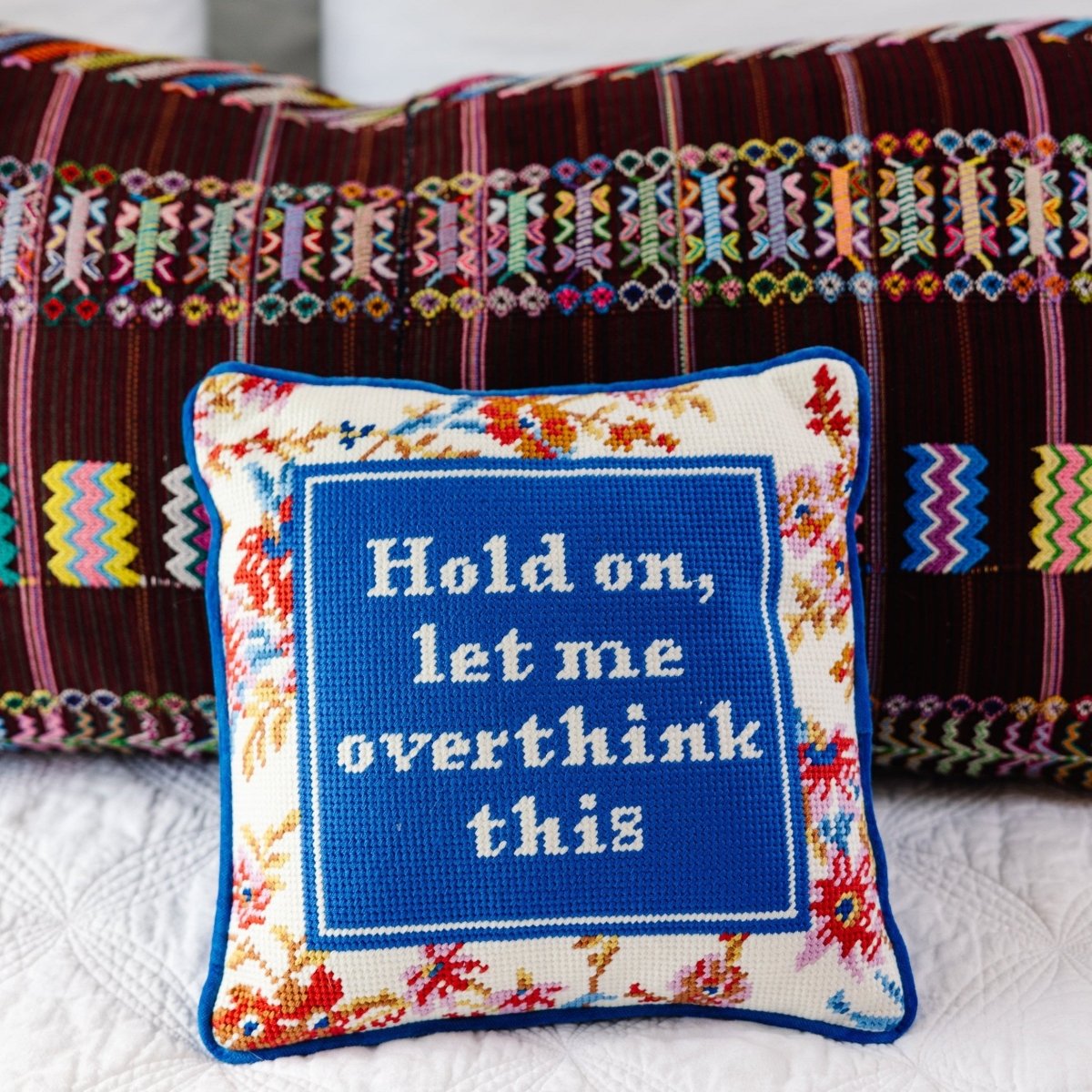 Overthink needlepoint pillow with 100% wool embroidery and cotton velvet back, measuring 9x15 inches, perfect for adding a witty accent to your decor