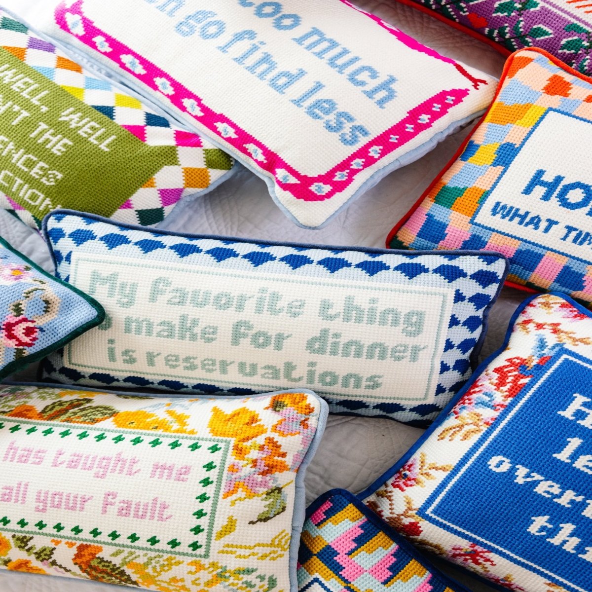 Reservations needlepoint pillow with 100% wool front and cotton velvet back, 8x14 inches, ideal for humor-filled, stylish decor.