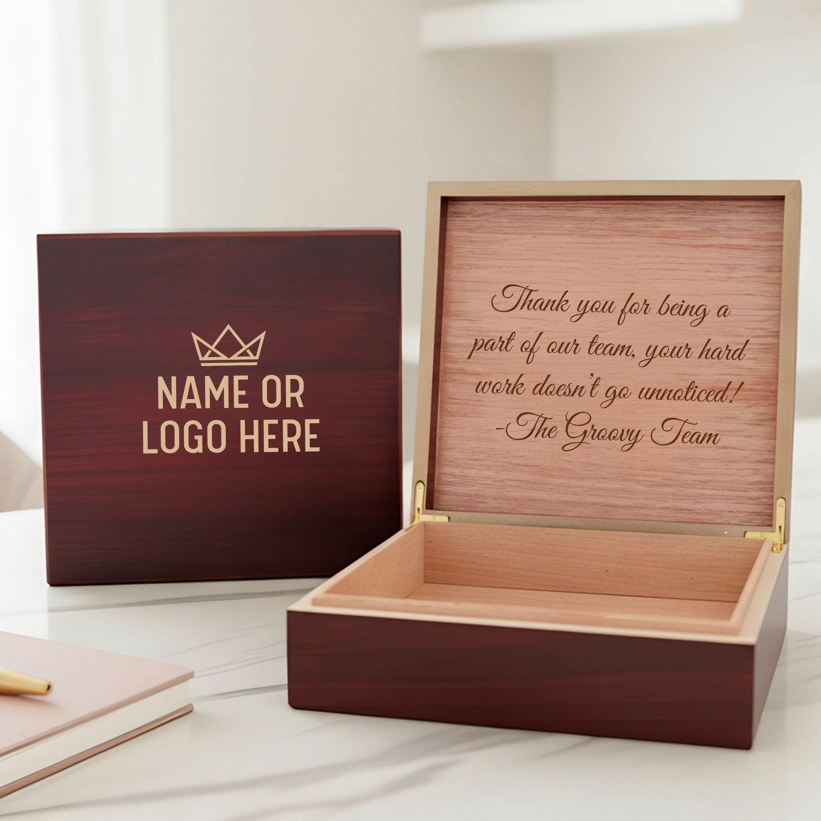 Dark cherry wood keepsake box with lid open, showing interior cedar lining and engraved text reading "Thank you for being a part of our team, your hard work doesn't go unnoticed! -The Groovy Team