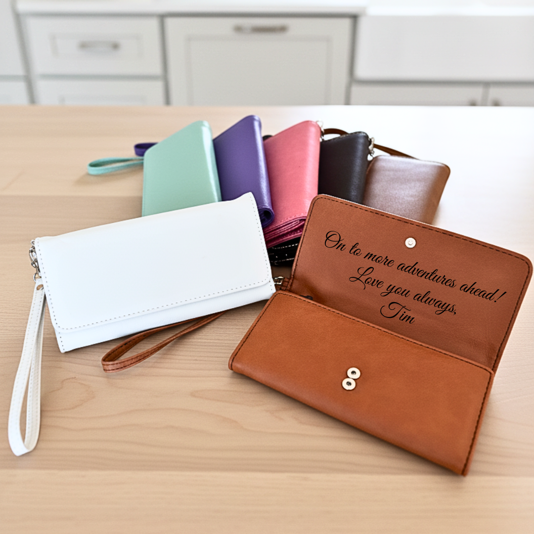 White and brown personalized wristlets side by side, each engraved inside the flap with a different sentimental message.