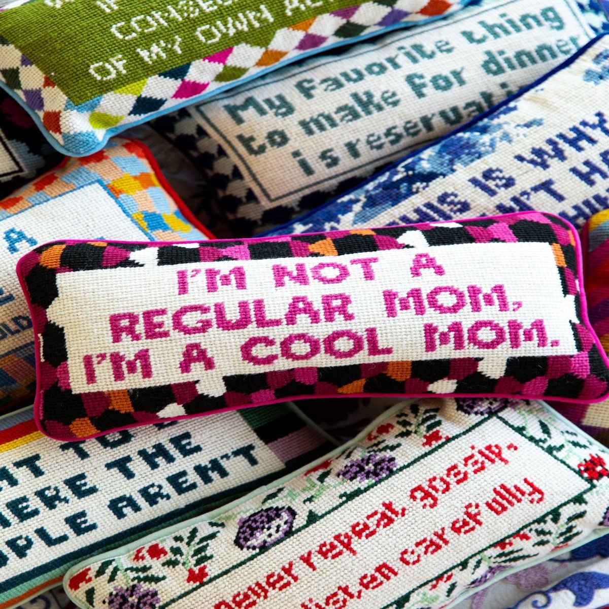 Cool Mom needlepoint pillow featuring 100% wool embroidery and cotton velvet backing, 8x14 inches, perfect for adding humor to any space.