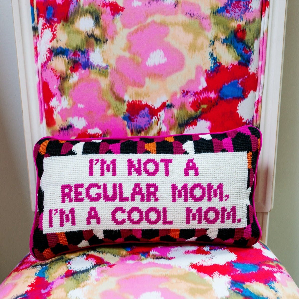 Cool Mom needlepoint pillow featuring 100% wool embroidery and cotton velvet backing, 8x14 inches, perfect for adding humor to any space.