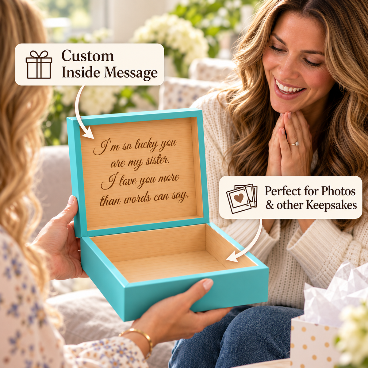 Turquoise wooden keepsake box with engraved message on open lid, held open by woman to display interior storage space with callout noting custom message and photo storage