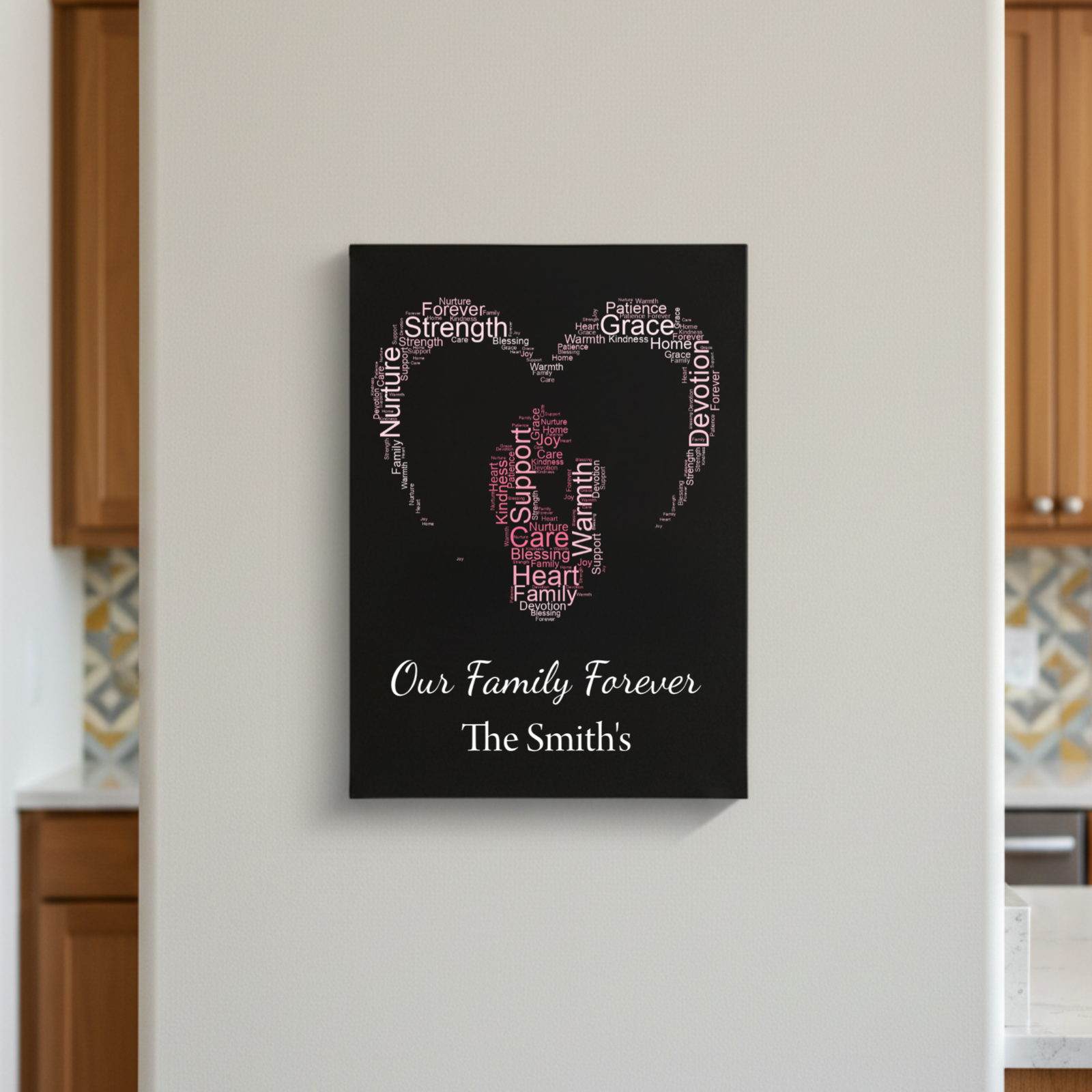 Black canvas with word cloud forming a silhouette of two faces, personalized with sample text "Our Family Forever" and "The Smith's" in script below, displayed on white wall.
