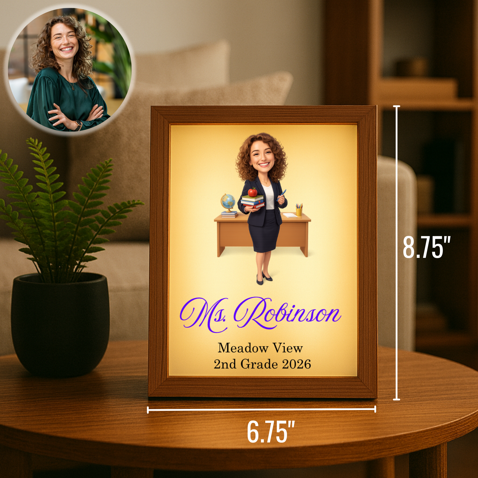 Personalized light frame with wood border displaying cartoon teacher illustration, sample name "Ms. Robinson" and school details, dimensions 6.75" x 8.75", on wooden desk with plant.