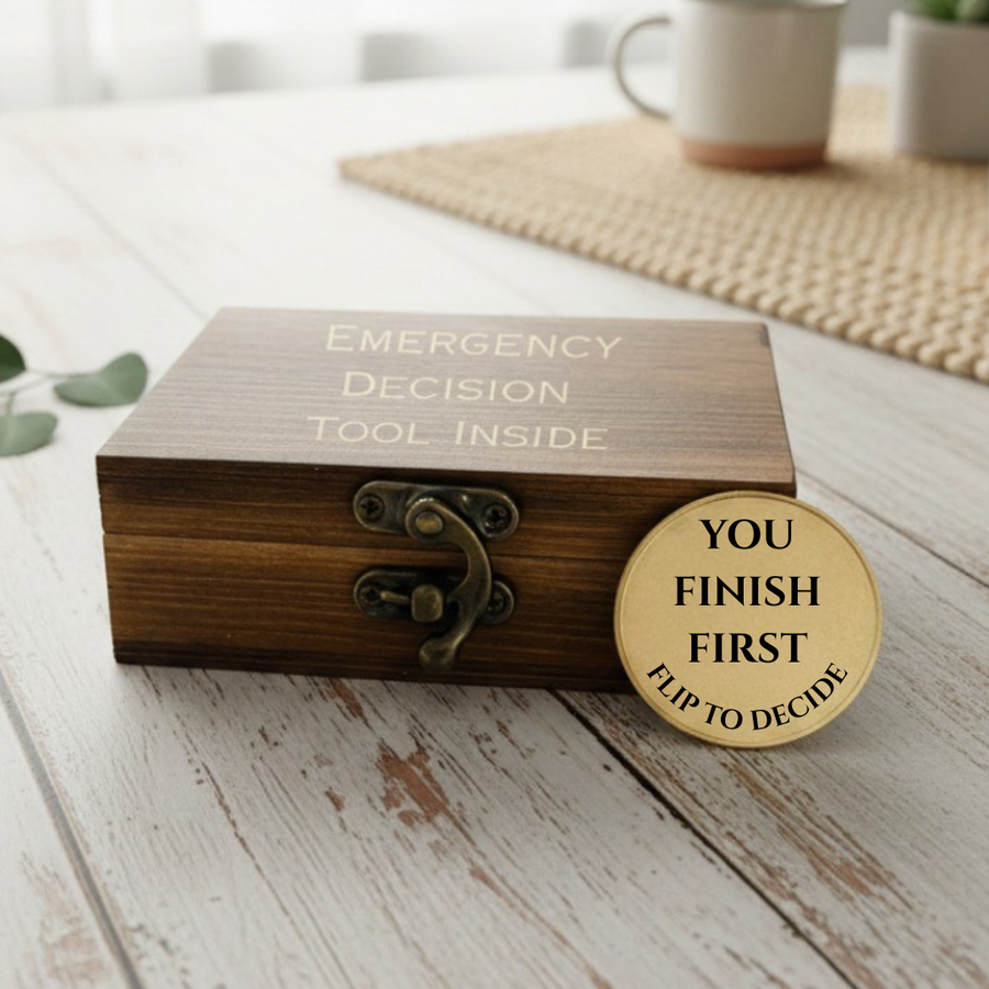 Dark wood box with brass clasp, engraved with "Emergency Decision Tool Inside," displayed with brass decision coin reading "You Finish First Flip To Decide
