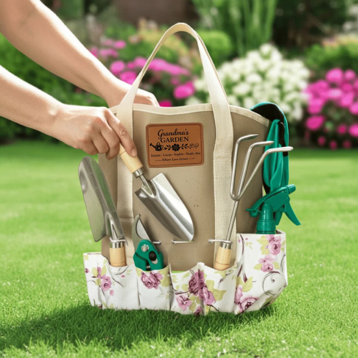 Grandma's Garden personalized tote set with rawhide patch engraved with grandkids' names, displayed against light green polyester garden tote with stainless-steel tools