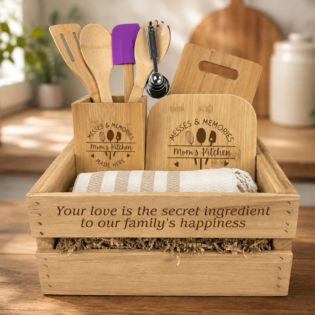 Personalized Mom's Kitchen Essentials gift set in a cedar crate with engraved bamboo utensil holder, cutting board, kitchen towel, and glass storage container.