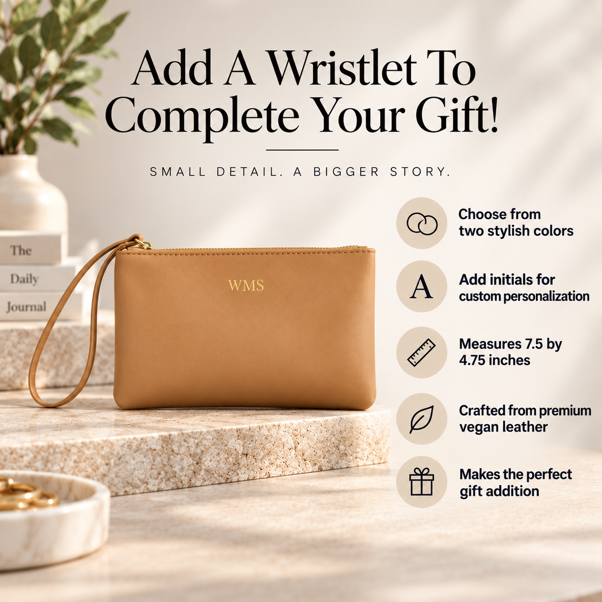 A tan leather wristlet clutch with a gold zipper and a gold monogrammed 'WMS' logo, displayed on a stone pedestal with promotional text and feature callouts on a warm beige background.