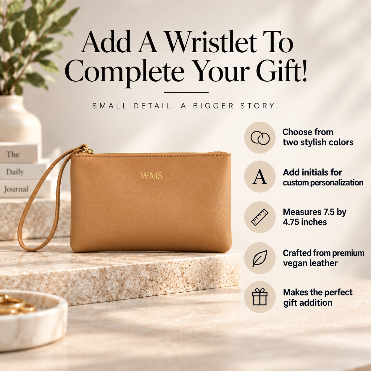 A tan leather wristlet clutch with a gold zipper and a gold monogrammed 'WMS' logo, displayed on a stone pedestal with promotional text and feature callouts on a warm beige background.