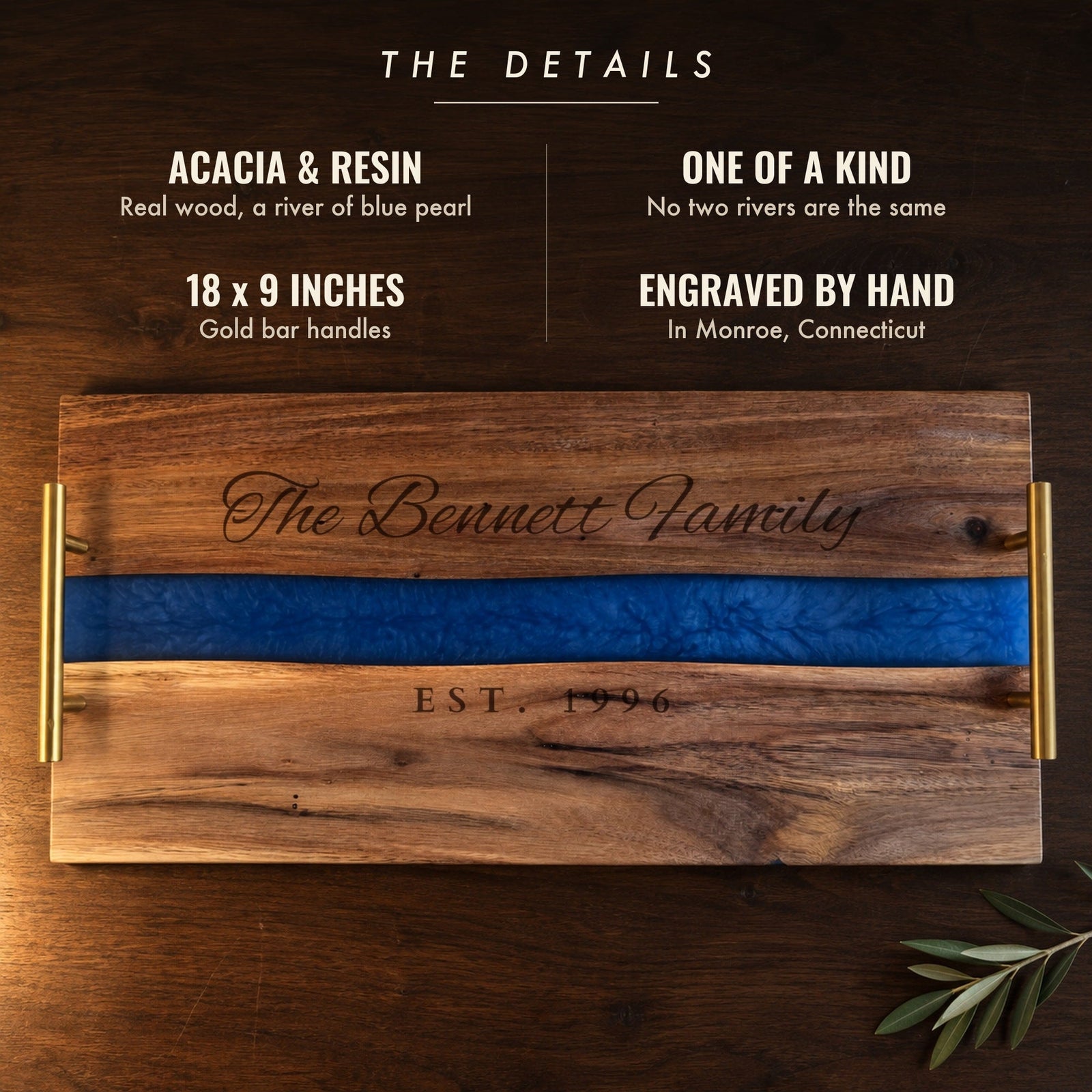 The details of the Blue River serving tray: acacia wood and blue pearl resin, one of a kind, 18 by 9 inches with gold bar handles, engraved by hand in Connecticut