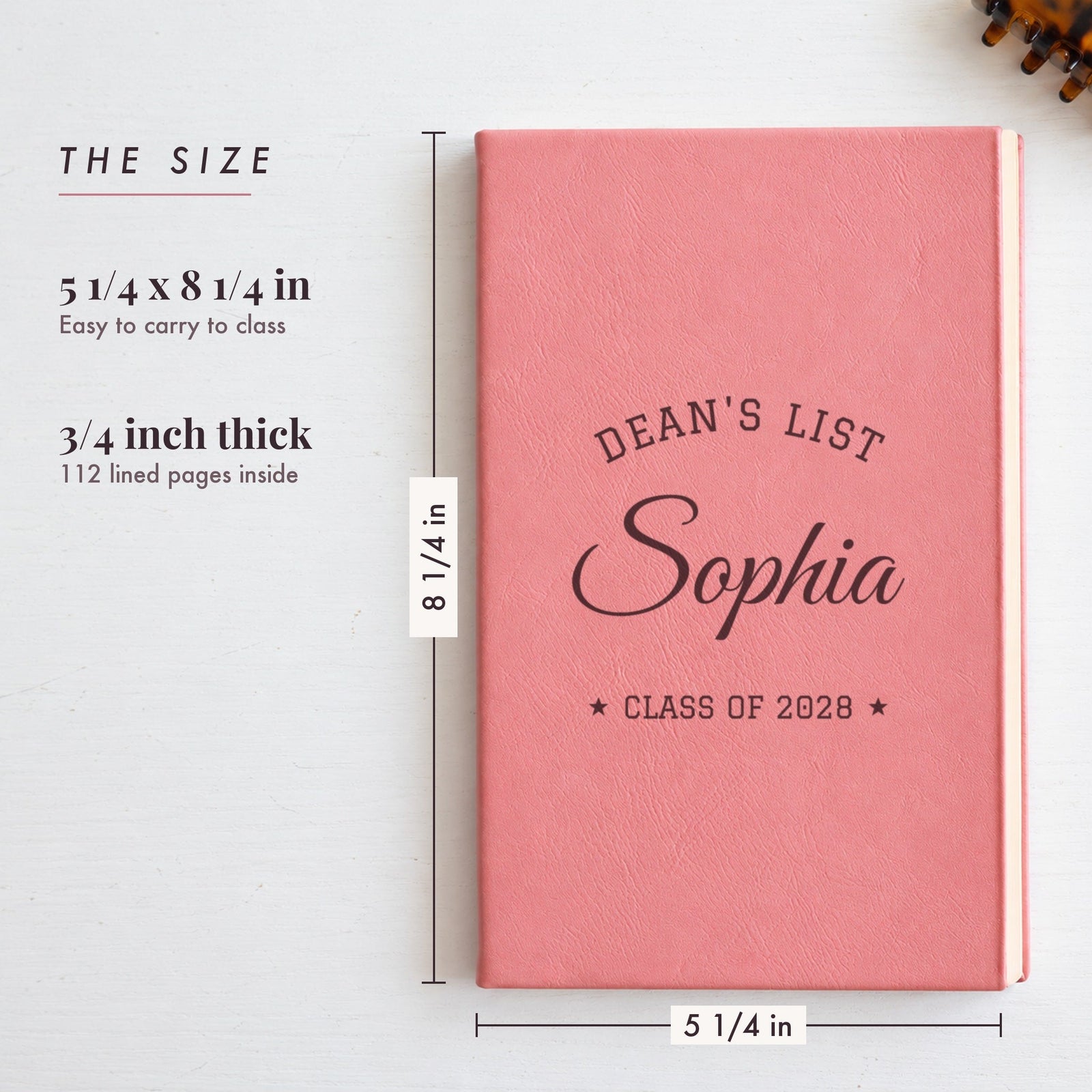 Size of the collegiate arch journal, 5 1/4 by 8 1/4 inches, shown in pink as Dean's List, Sophia, Class of 2028, a gift for a college girl