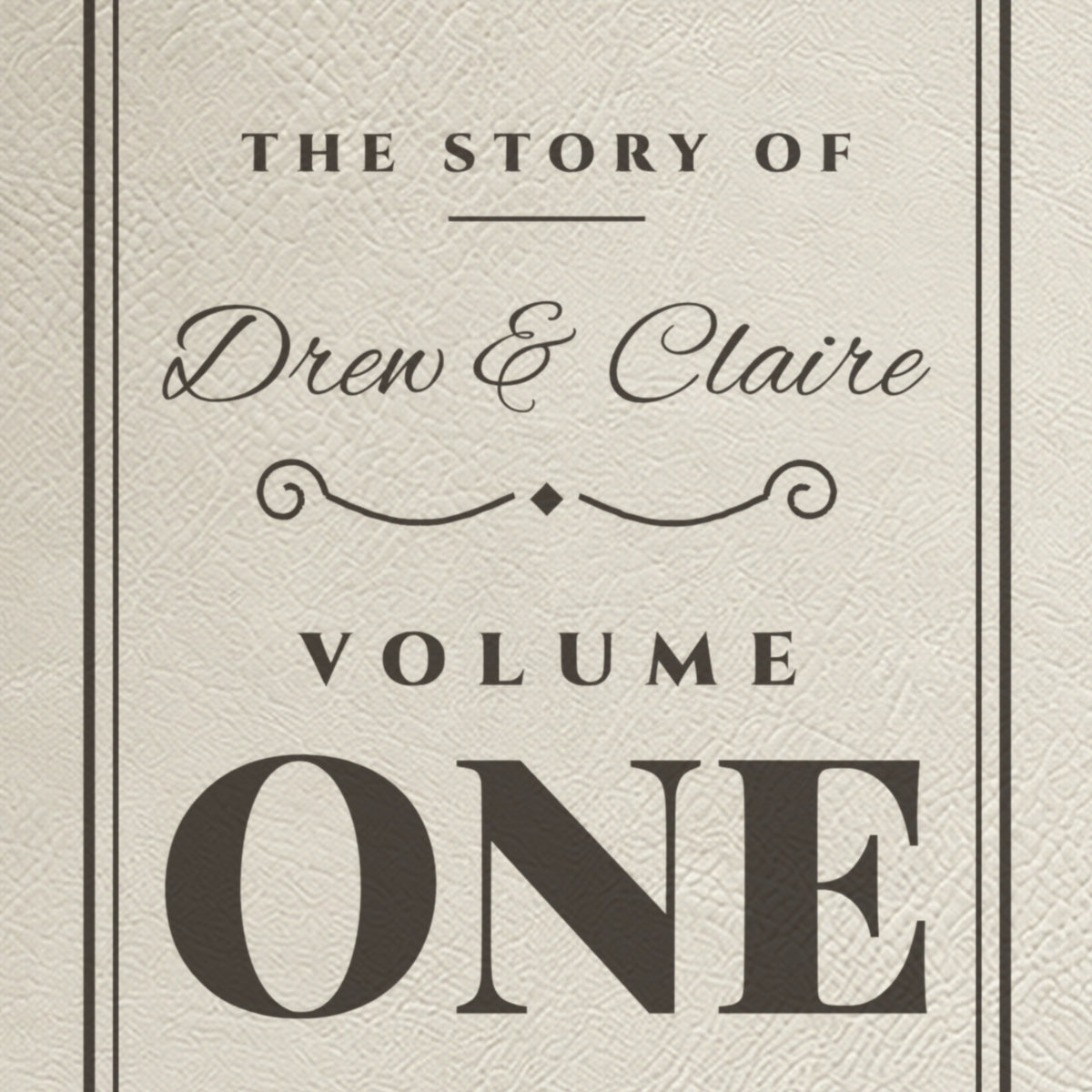 Close-up of the engraving on the first anniversary journal: Drew & Claire in script above a big Volume One and Our First Year of Marriage