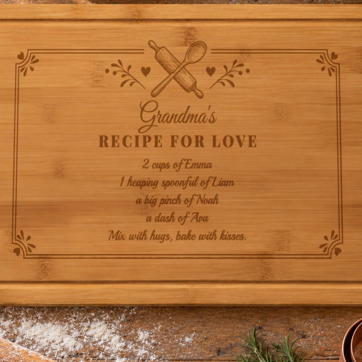 Close-up of the laser engraving on the grandma recipe board: Grandma's Recipe for Love, 2 cups of Emma, 1 heaping spoonful of Liam