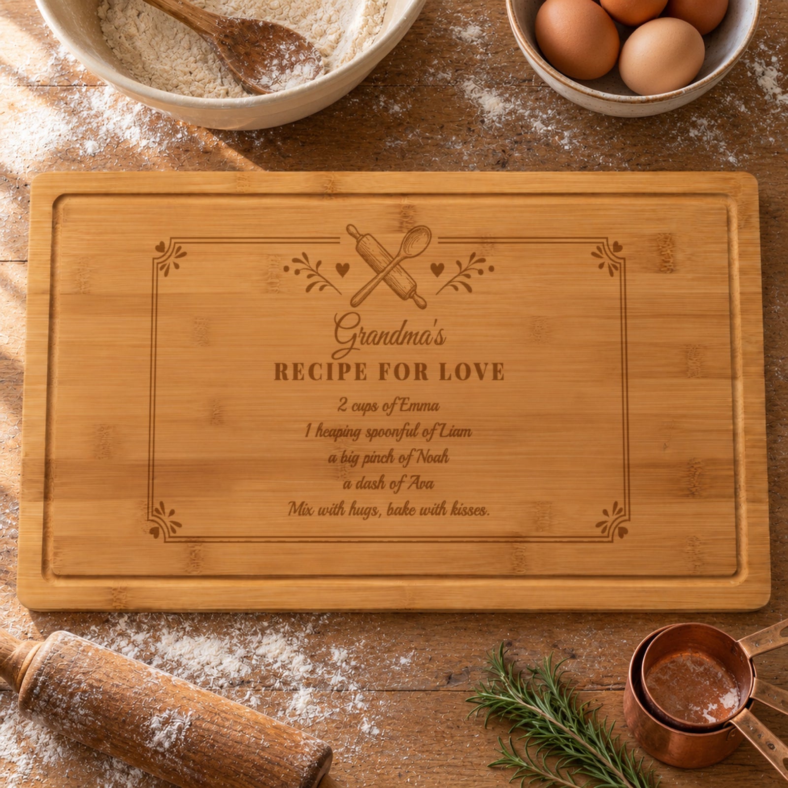 Grandma recipe cutting board engraved Grandma's Recipe for Love with 2 cups of Emma, a big pinch of Noah and more grandkids, on a flour-dusted baking table