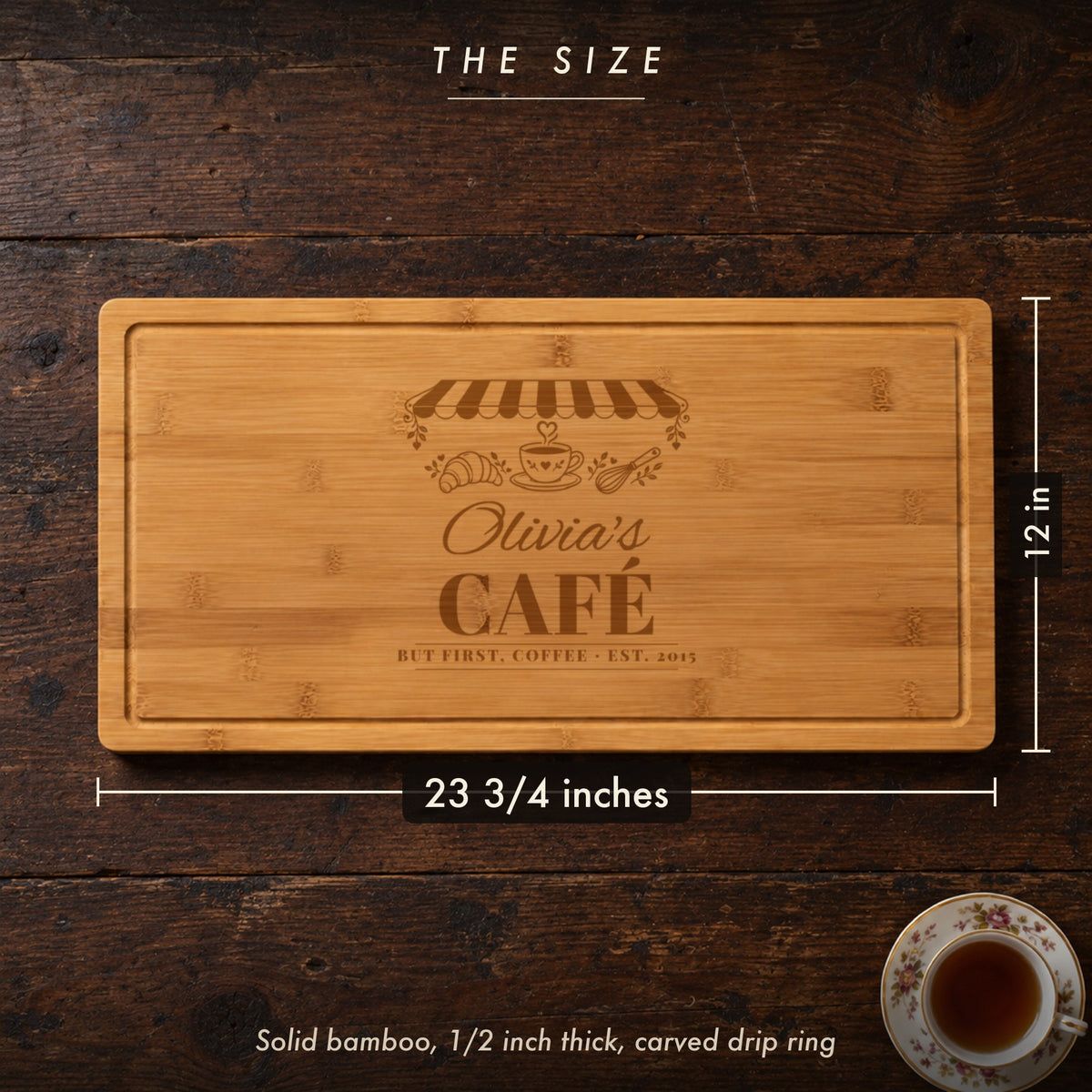 Size of the Her Café cutting board, 23 3/4 inches long by 12 inches wide in half inch solid bamboo, engraved Olivia's CAFÉ BUT FIRST COFFEE
