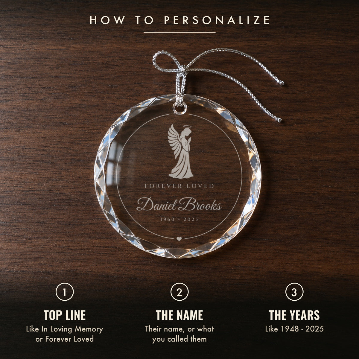How to personalize the angel memorial ornament: 1 top line, 2 their name, 3 their years, shown on a walnut table with Daniel Brooks engraved
