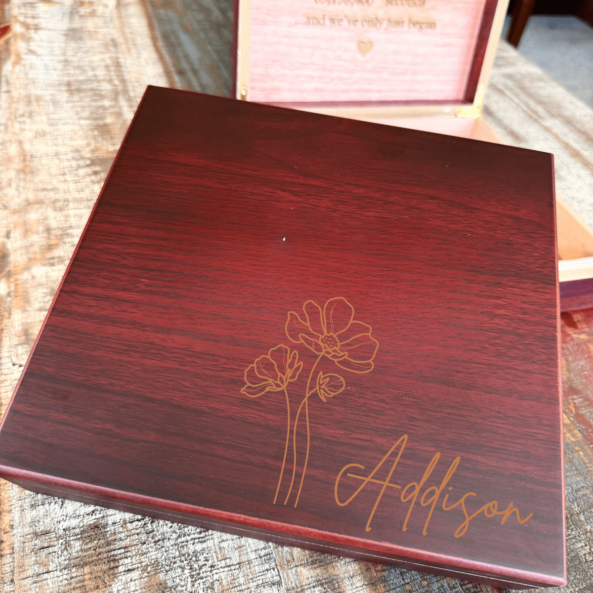 Cherry wood jewelry box with engraved birthflower, personalized name, and custom message inside lid