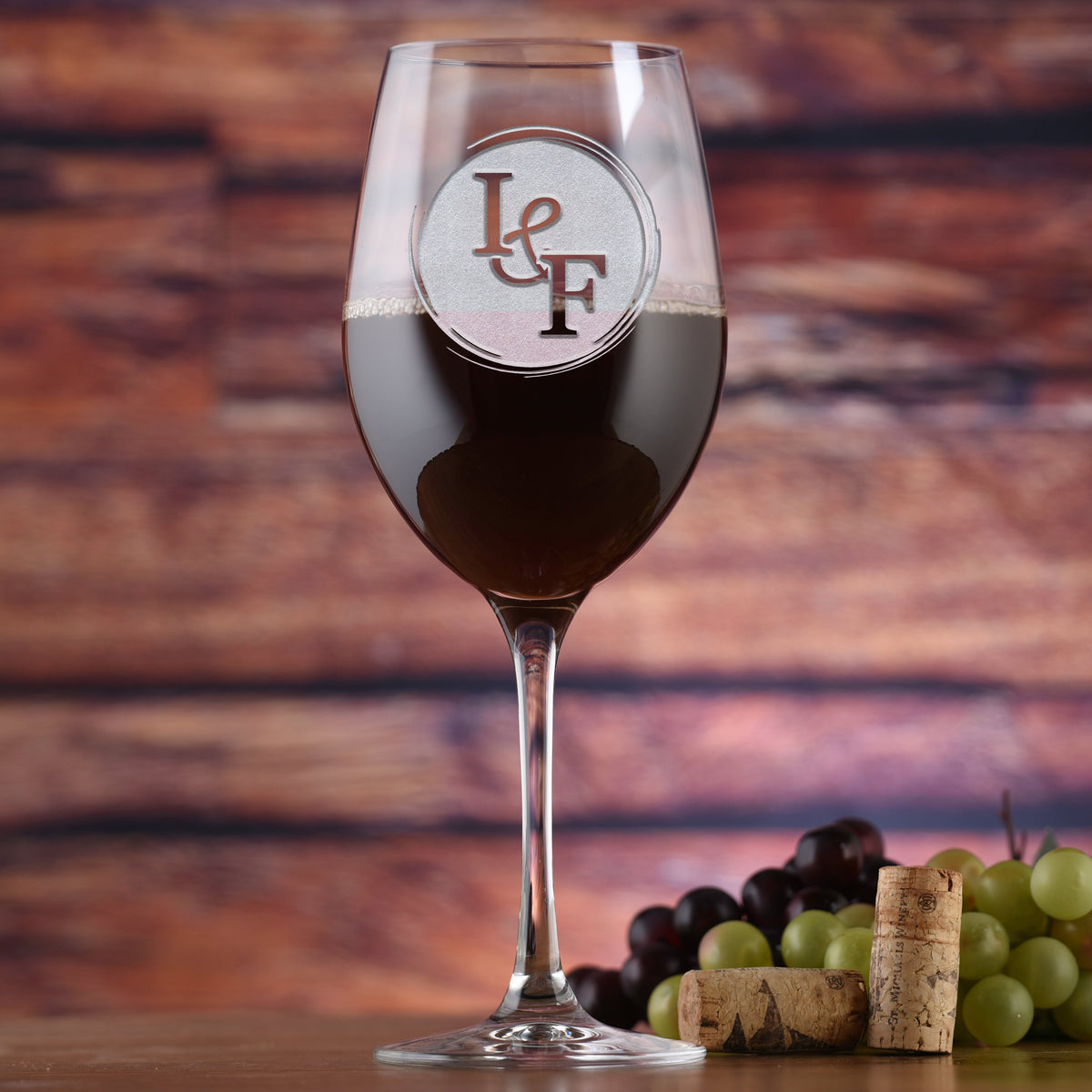 Anniversary Crystal red wine glass personalized with couple's two initials — Stolzle crystal sand-carved engraving