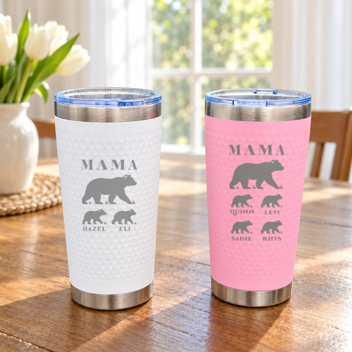White and pink mama bear tumblers side by side, one with two named cubs and one with four, showing both color options for mom