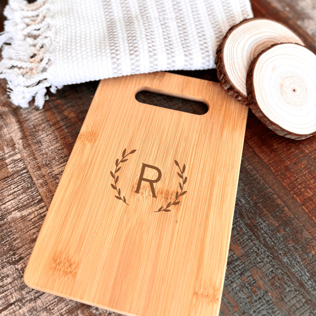 Personalized copper mule gift set with engraved mugs, shaker, and coasters in a rustic wood basket