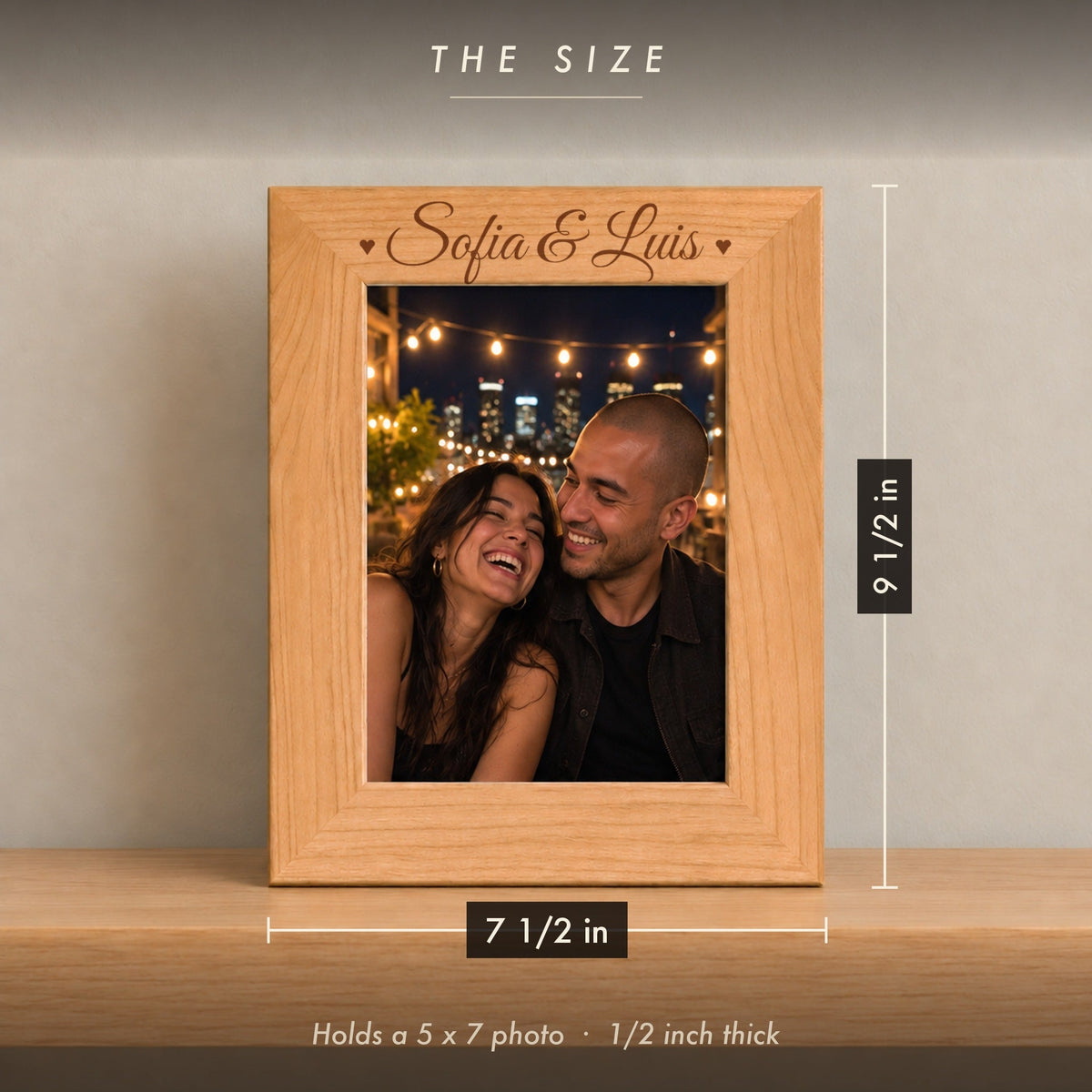 Size of the personalized couples picture frame, 7 1/2 inches wide by 9 1/2 inches tall, holding a 5 x 7 photo, engraved Sofia & Luis