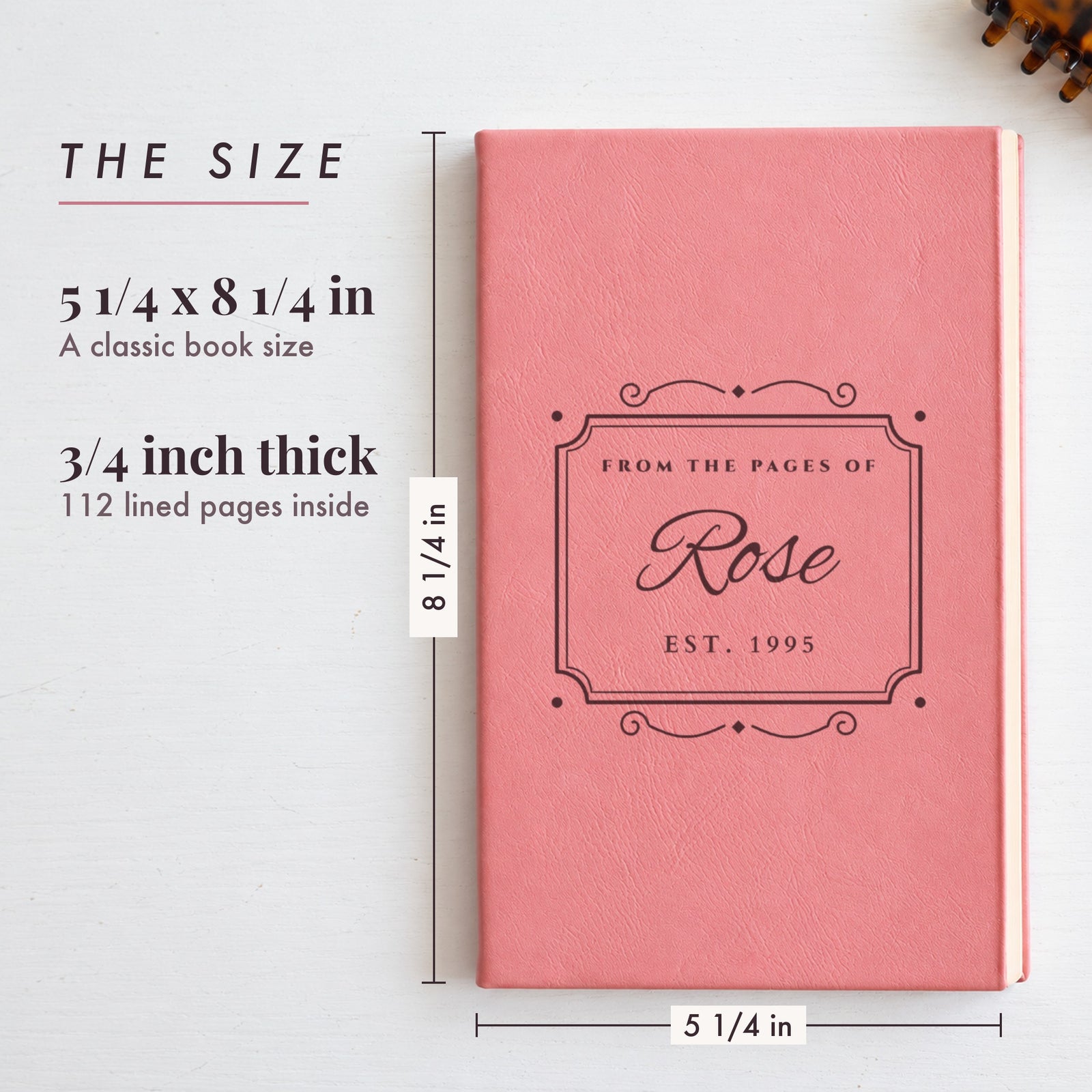 Size of the personalized name journal, 5 1/4 by 8 1/4 inches and 3/4 inch thick, shown in pink engraved with Rose and Est. 1995