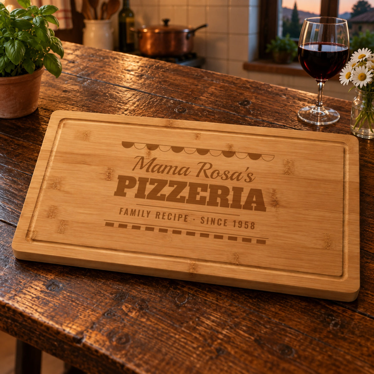 Engraved pizza board for mom reading Mama Rosa's PIZZERIA FAMILY RECIPE SINCE 1958 in a warm Italian family kitchen with red wine, daisies and basil
