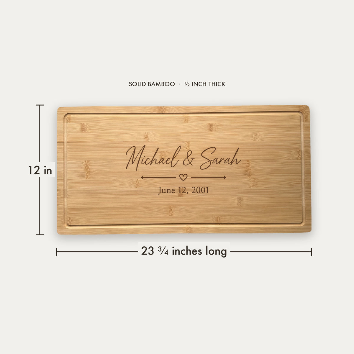 Size guide for the personalized wedding charcuterie board, 23 and three quarter inches long by 12 inches wide in half inch thick solid bamboo.
