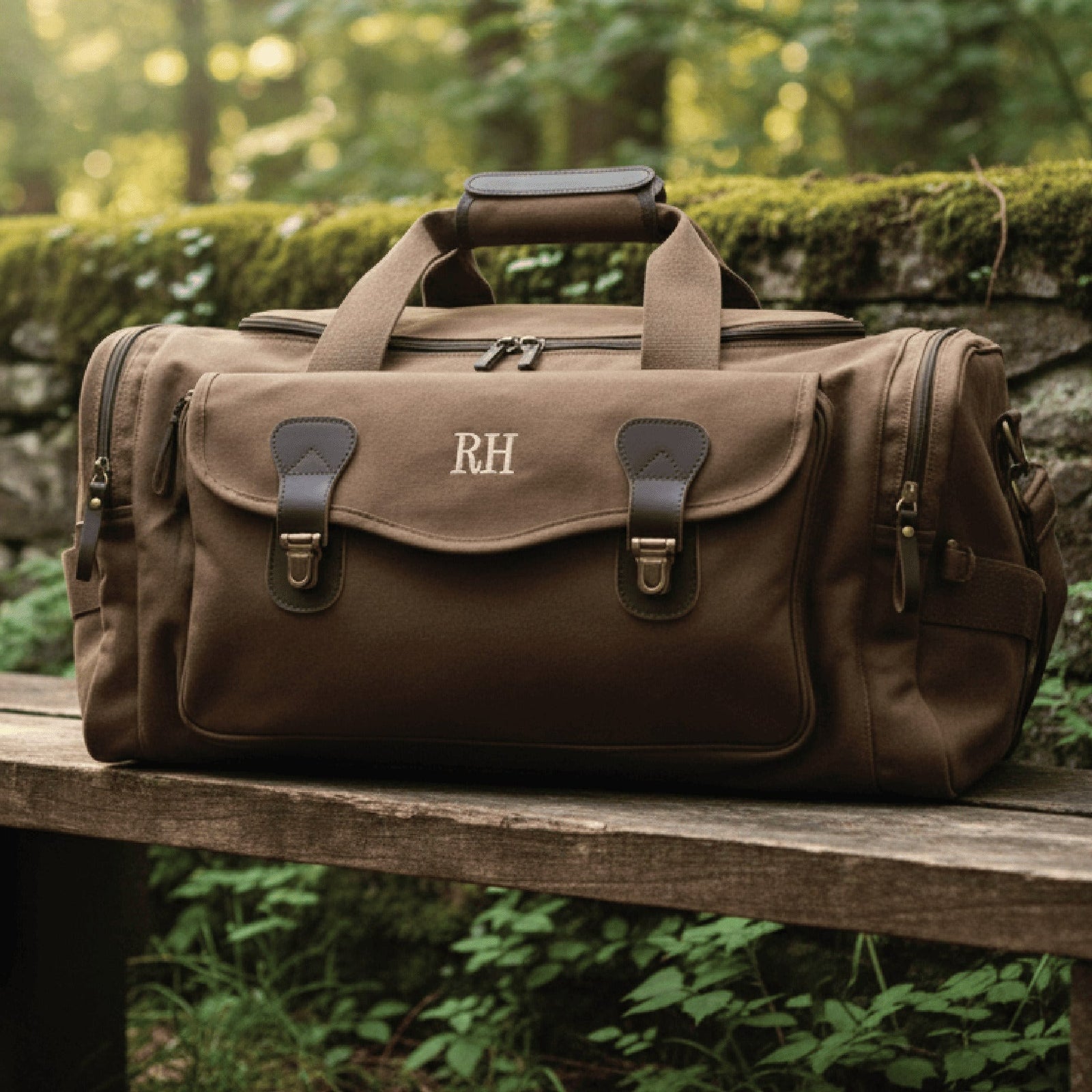 personalized gifts for men Brown duffel bag with 'RH' monogram on a wooden bench