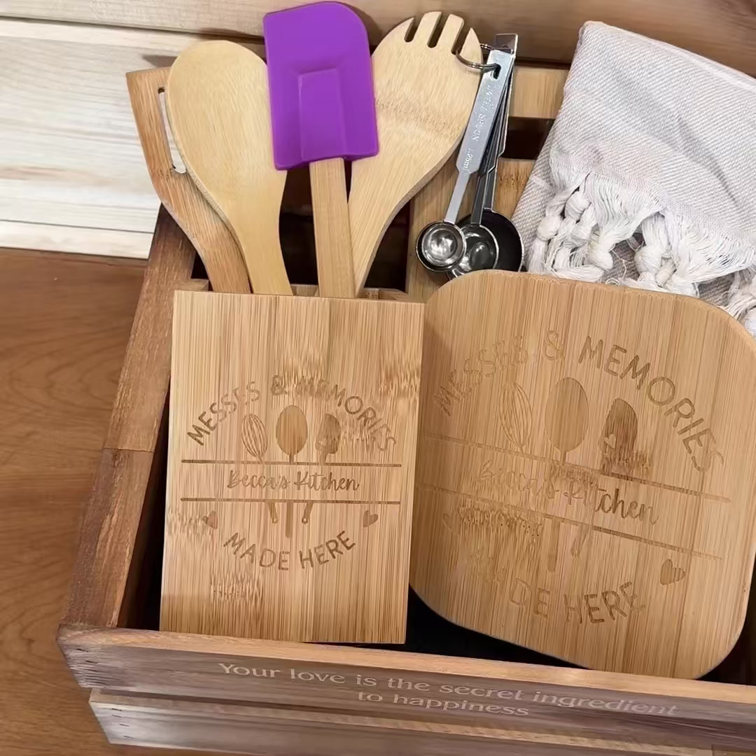 Anniversary gift set with personalized cutting board, engraved spoon, and matching towel.