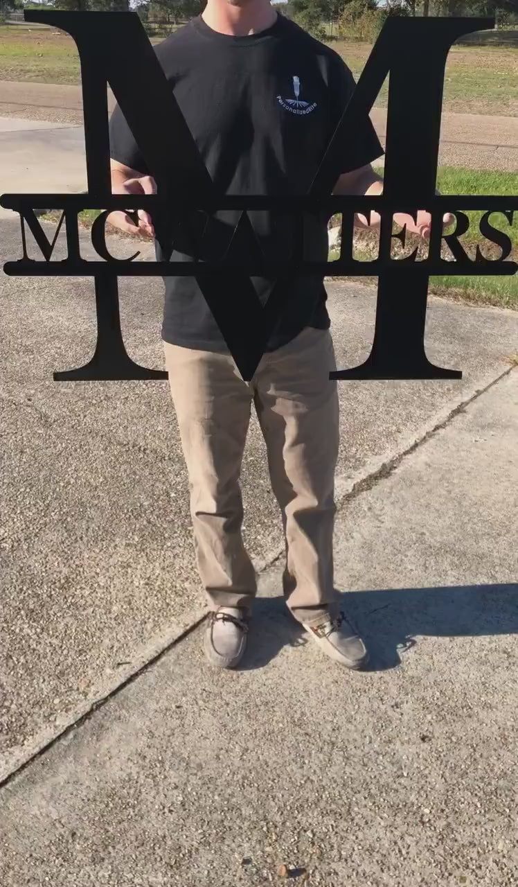 Custom split-letter metal sign with personalized family name and initial