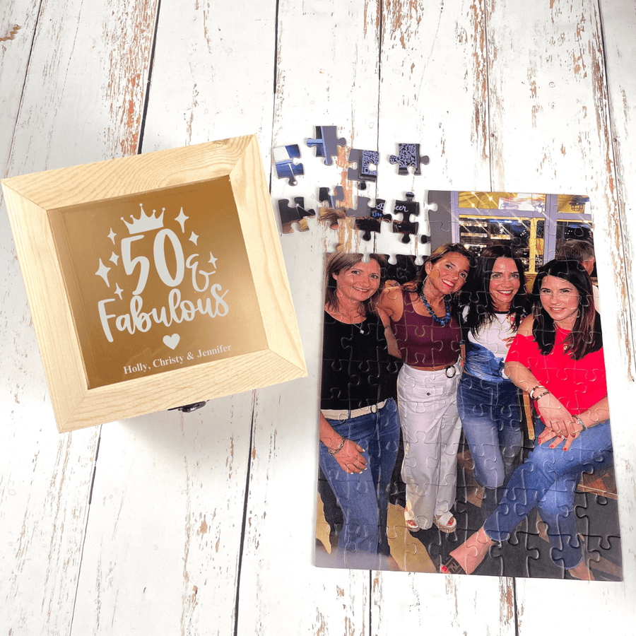 Wooden keepsake box engraved '50 & Fabulous' with a sample names line, plus a custom photo puzzle of a group of women