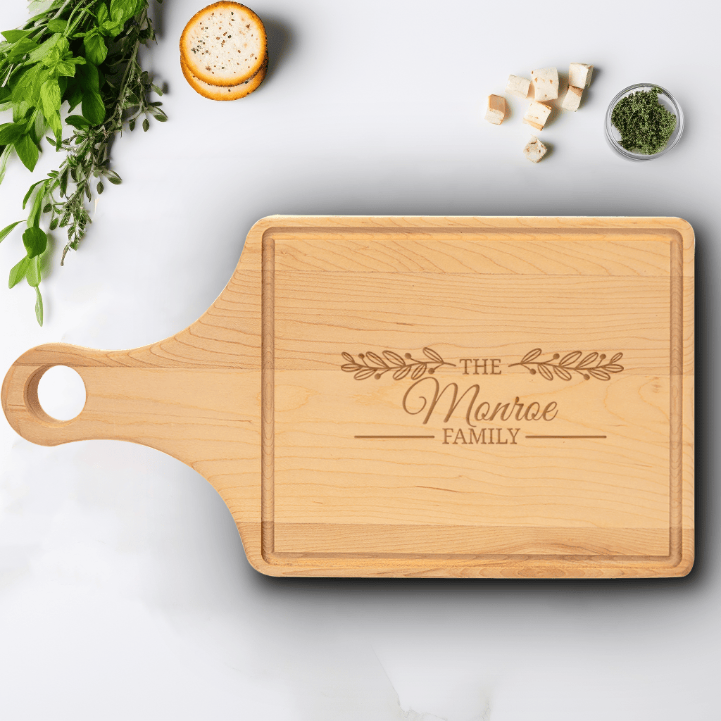 Family Name Maple Paddle Cutting Board With Lineage Leaf Design